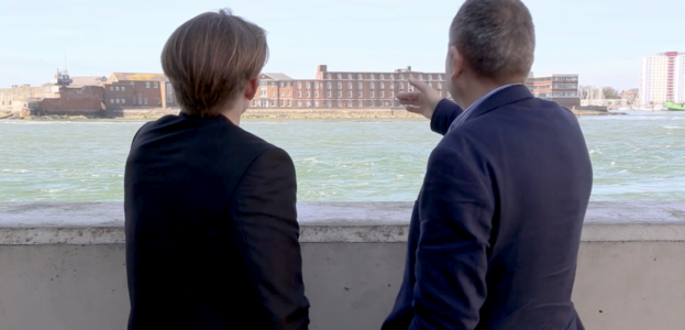 Dr. Beaven and Dr. Bell look over the waters of the Solent